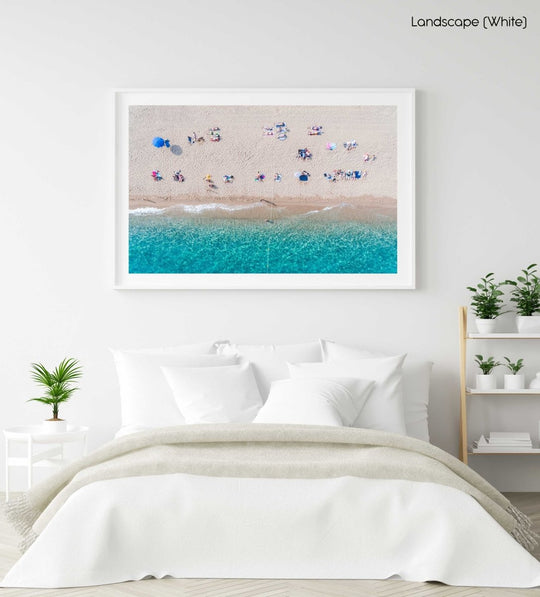 Lines of people tanning on beach in Spain from aerial view in a white fine art frame