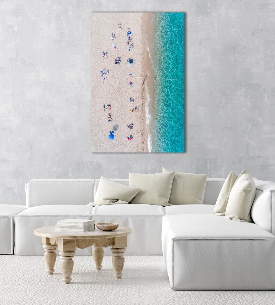 Lines of people tanning on beach in Spain from aerial view in a natural fine art frame