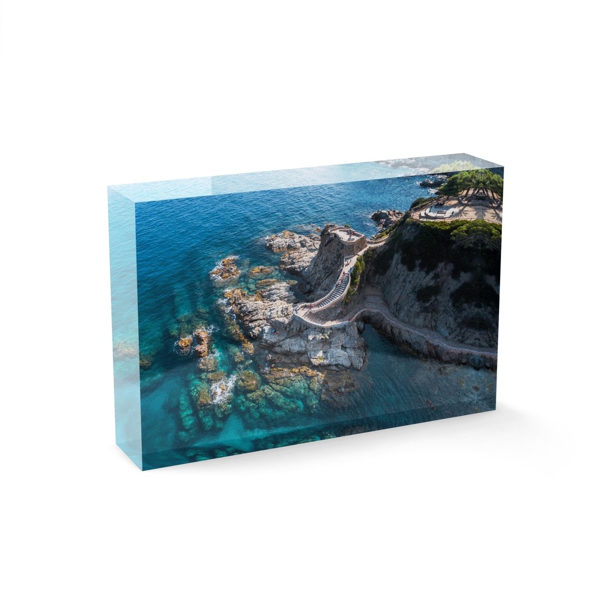 Stairway from above along blue water of Costa Brava