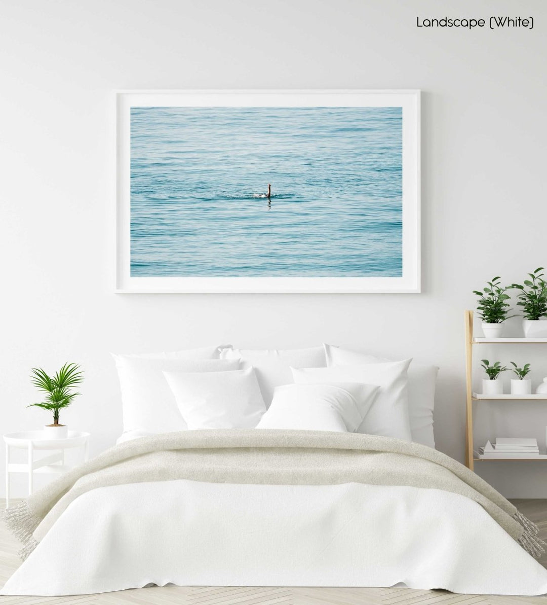 Woman swimming backstroke in the ocean in Costa Brava in a white fine art frame