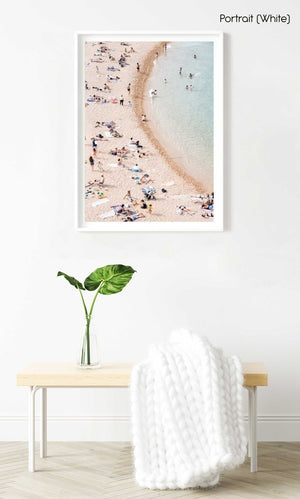 Light colors of people swimming at Tossa de Mar beach in a white fine art frame