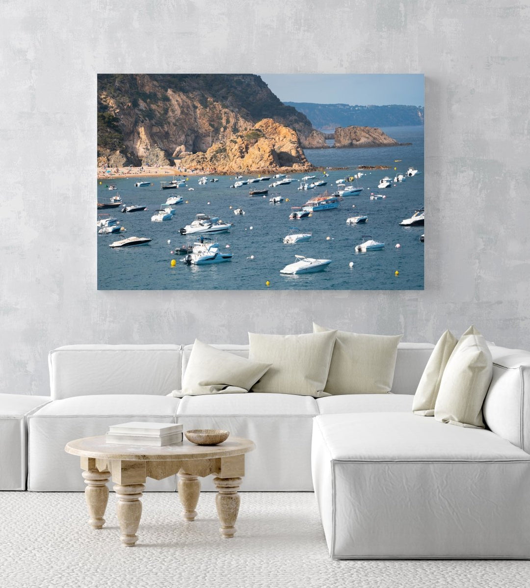 Many boats anchored off in ocean along Tossa de Mar beach in Spain in an acrylic/perspex frame