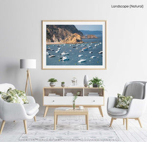 Many boats anchored off in ocean along Tossa de Mar beach in Spain in a natural fine art frame