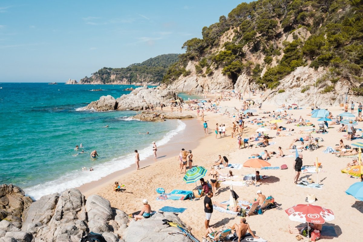 Packed beach along Costa Brava