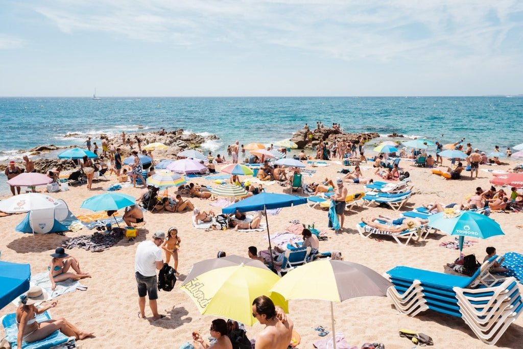 Lloret de Mar beach full of people and umbrellas