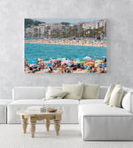 Crowds of people on either side of beaches at Lloret de Mar in an acrylic/perspex frame