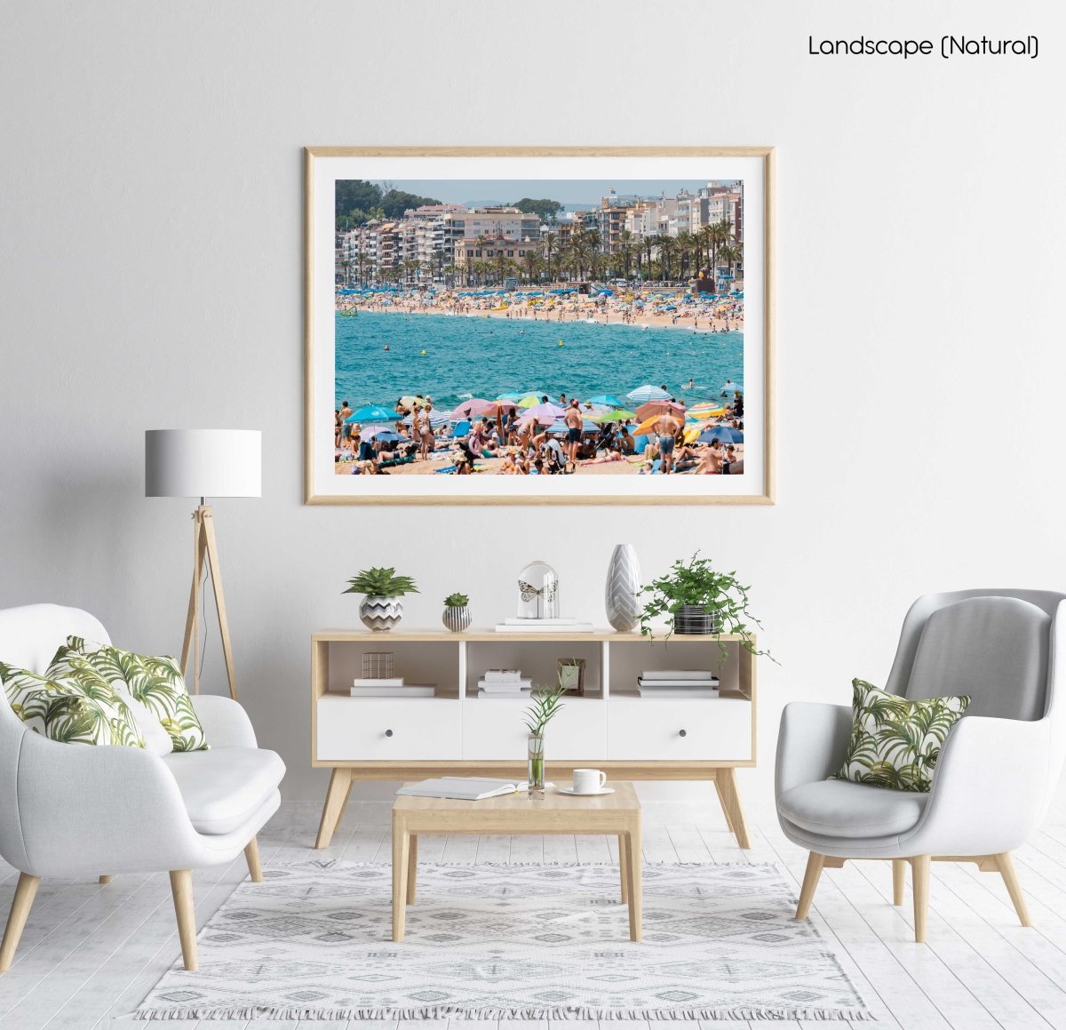 Crowds of people on either side of beaches at Lloret de Mar in a natural fine art frame