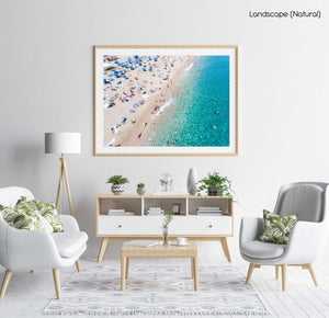 People swimming and having fun in blue water of Lloret de Mar in a natural fine art frame