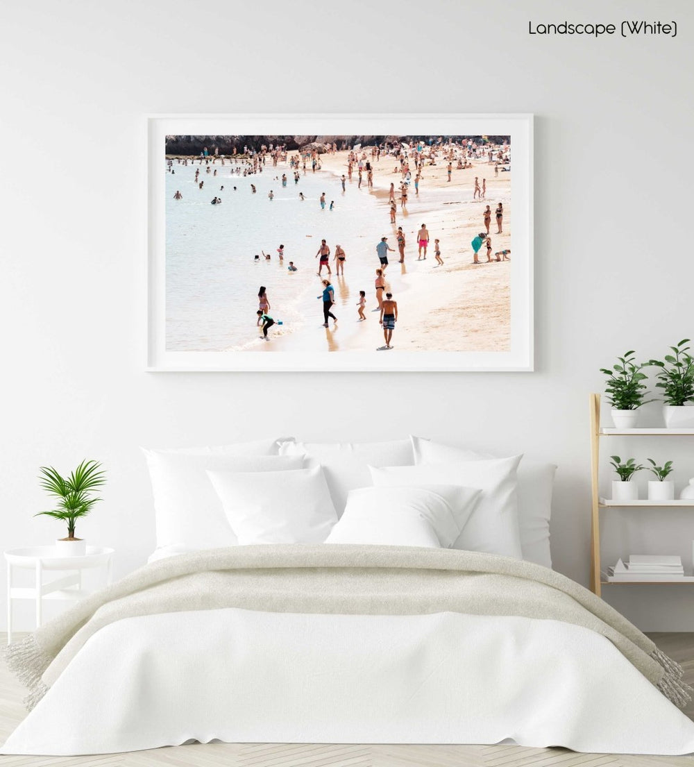 People playing and swimming on Cascais beach Portugal in a white fine art frame