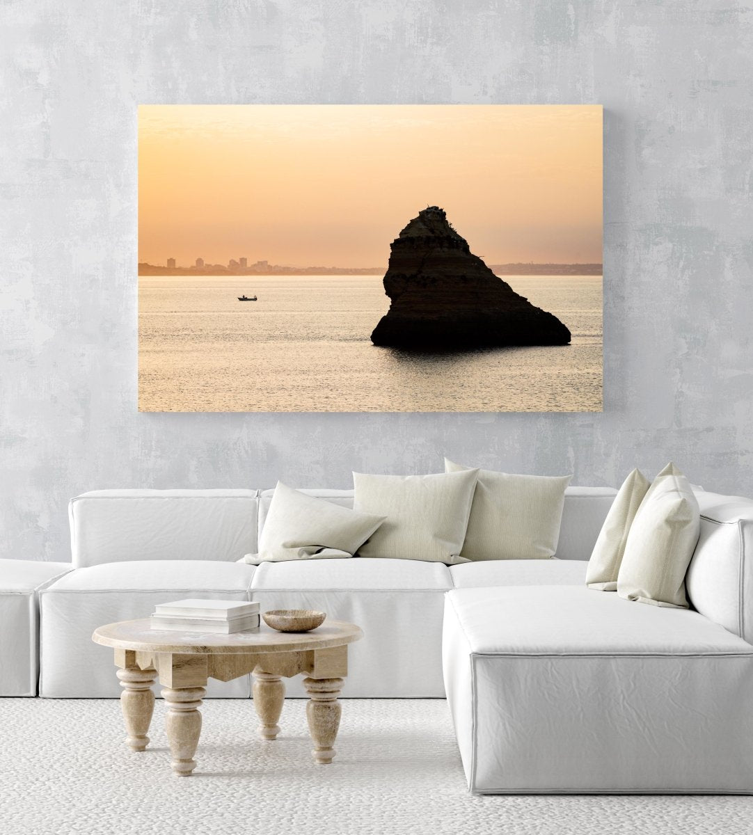Large boulder and a fishing boat during Lagos sunrise in an acrylic/perspex frame