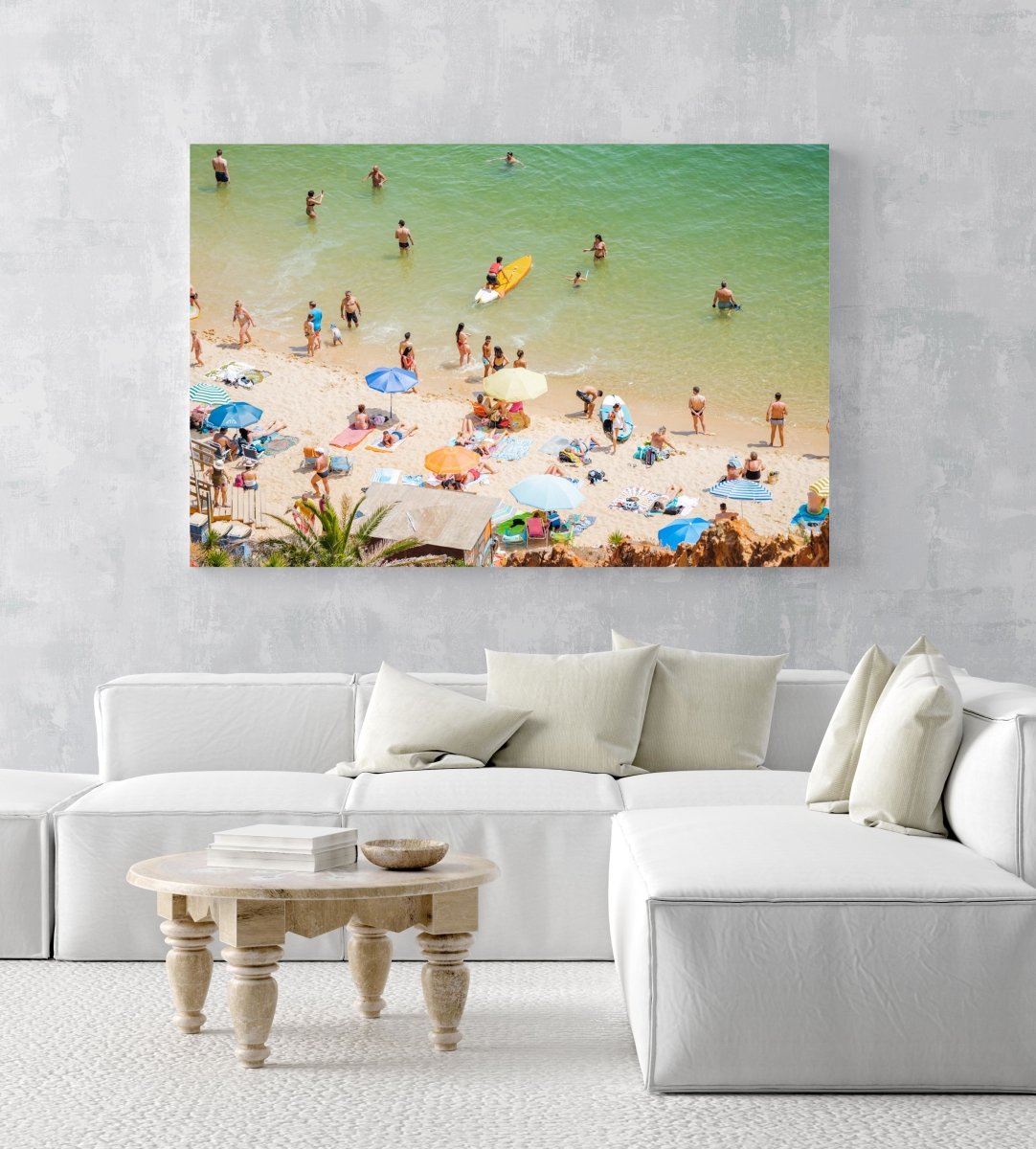 Colorful boards, people, water and sand on Praia do Camilo Lagos in an acrylic/perspex frame