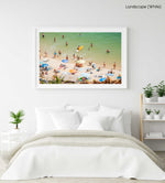 Colorful boards, people, water and sand on Praia do Camilo Lagos in a white fine art frame