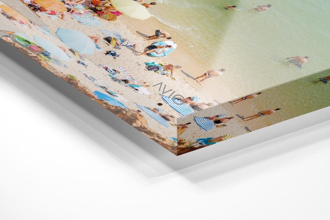 Colorful boards, people, water and sand on Praia do Camilo Lagos in an acrylic/perspex frame