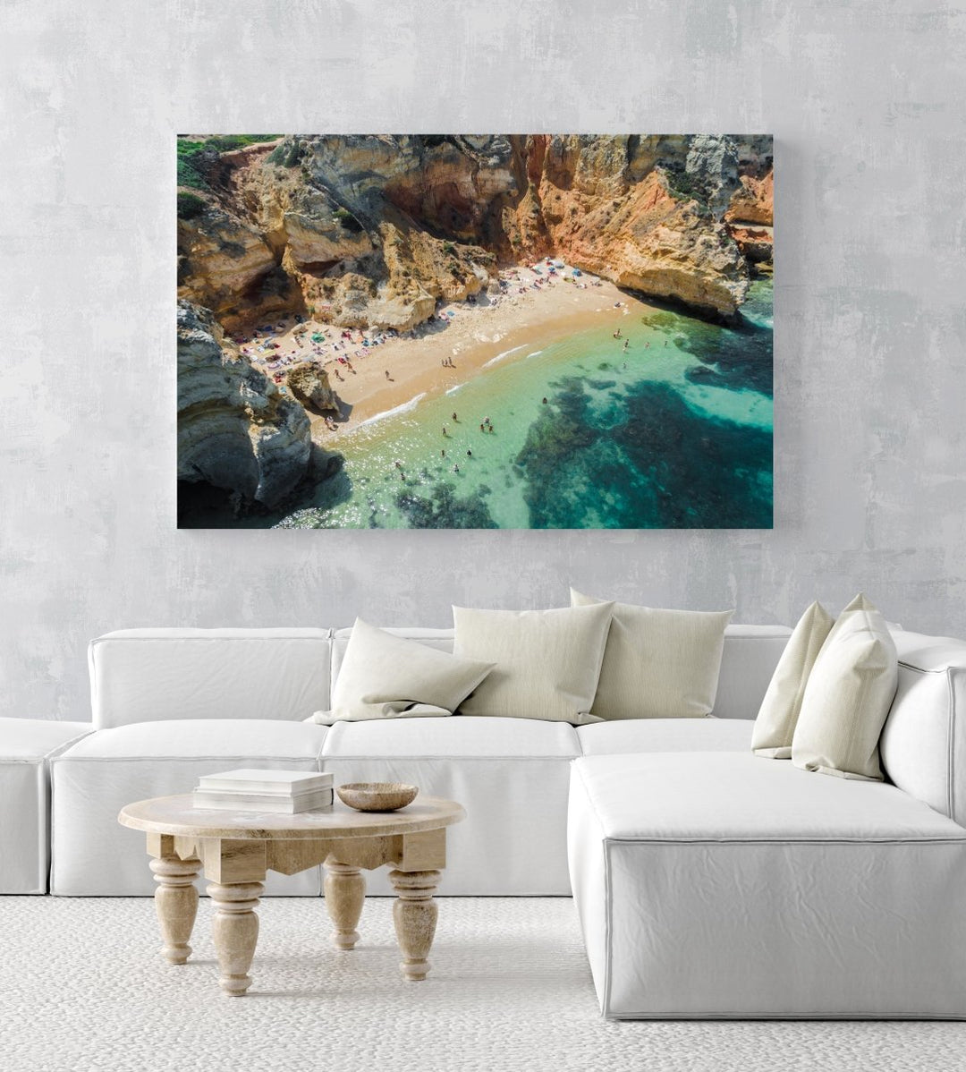 Aerial of clear water and cliffs at Camilo beach in Lagos