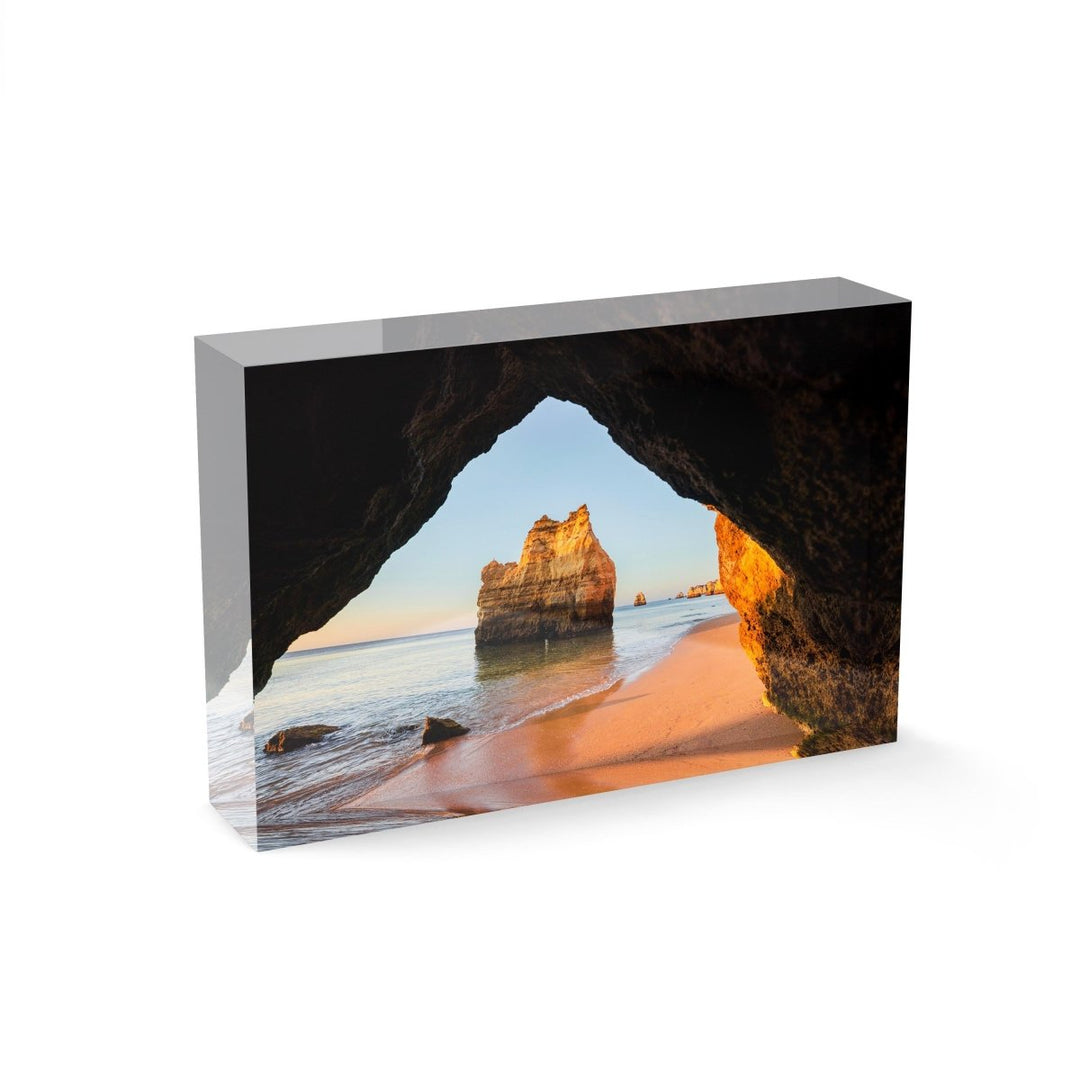 Inside a cave looking at cliffs along beach in Lagos