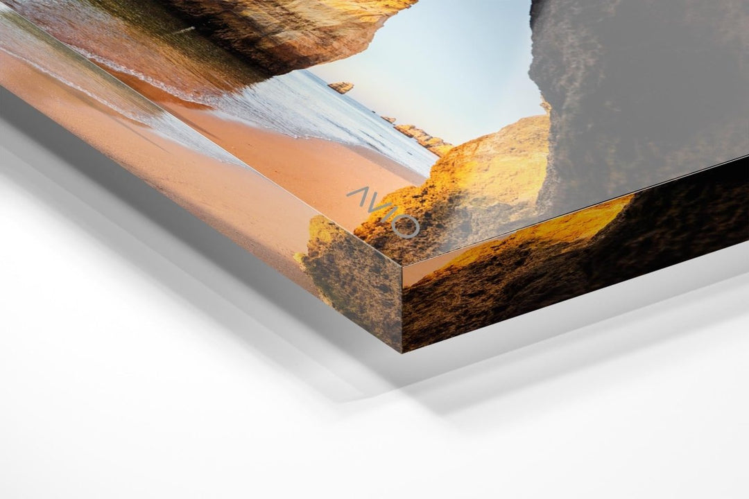 Inside a cave looking at cliffs along beach in Lagos