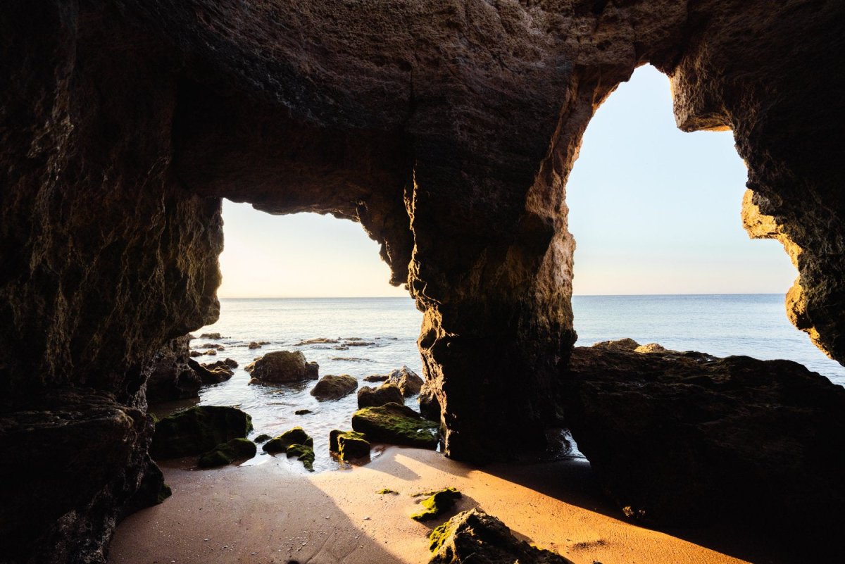 Sunrise light shining through caves in Lagos