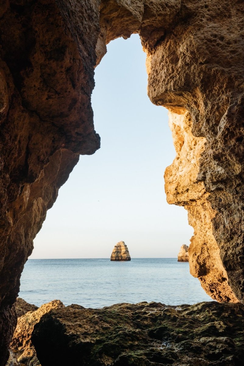 View out of a grotto in Lagos out to sea and cliff