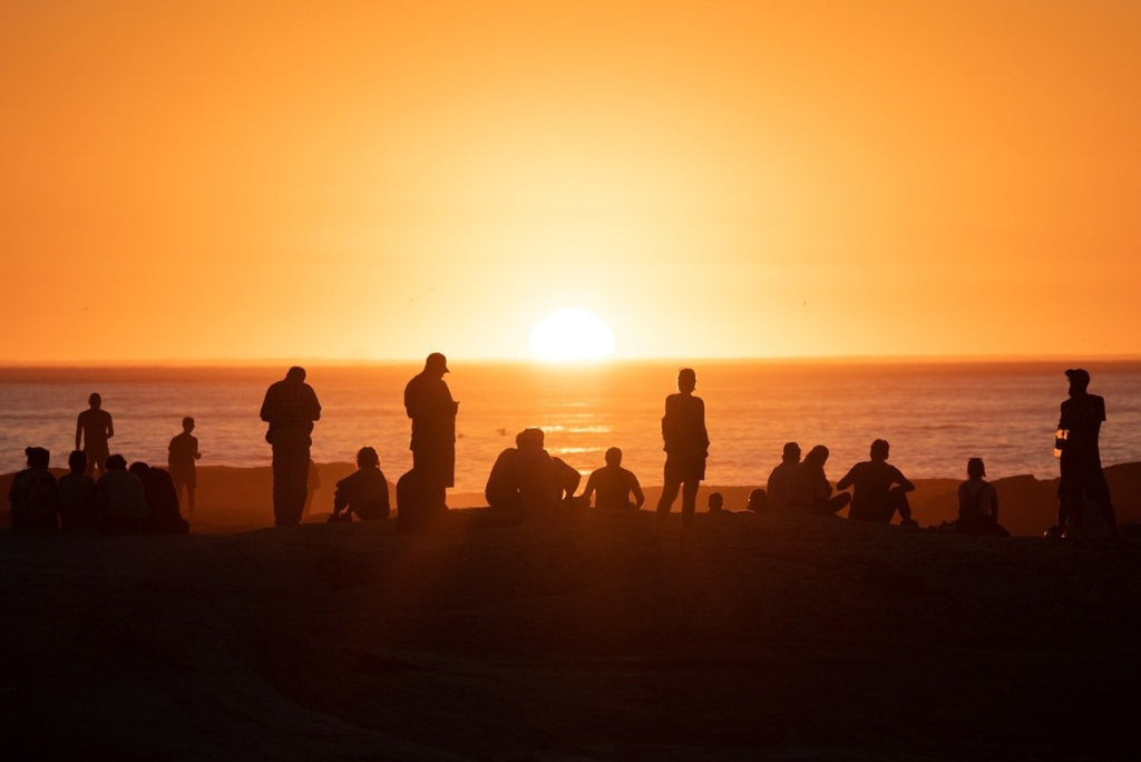 People watching sunset