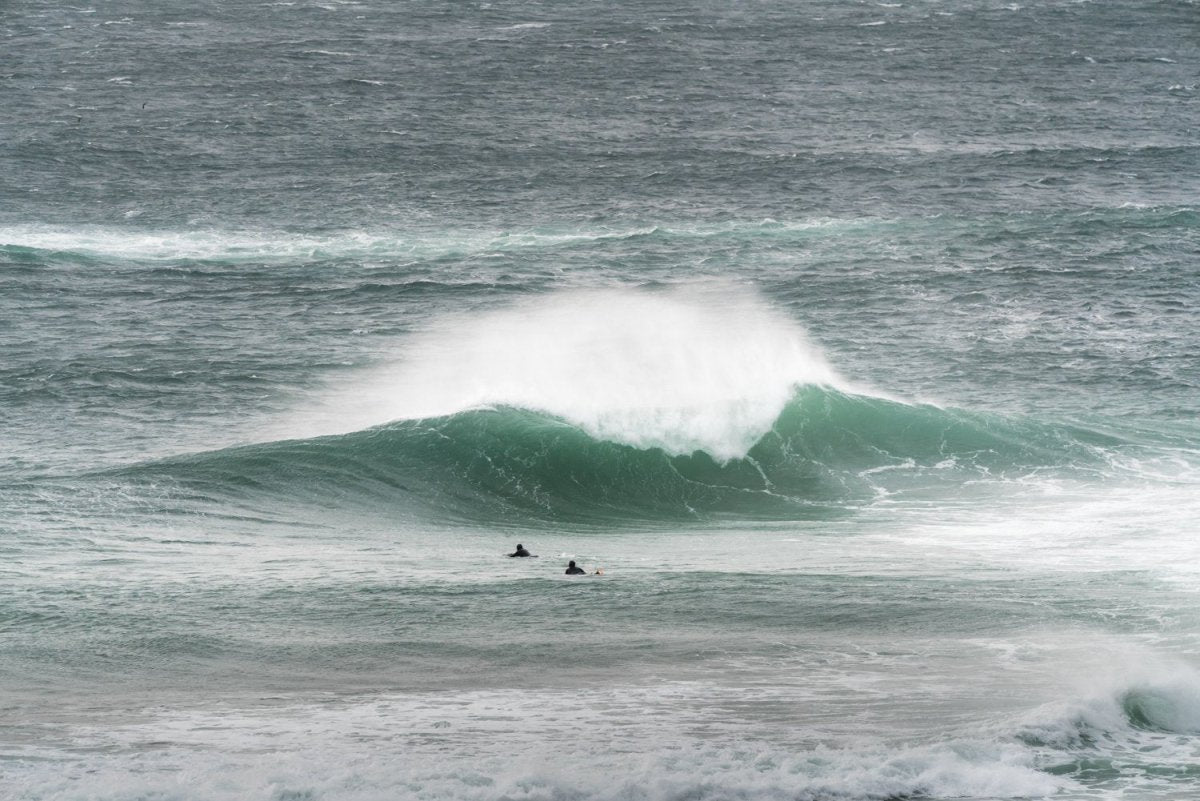 Big wave crashing out in ocean