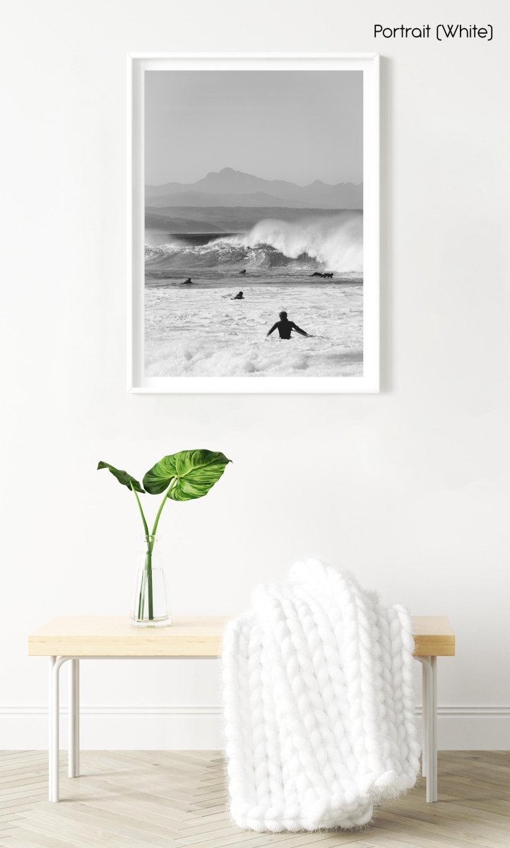 Black and white image of kids surfing in Plett
