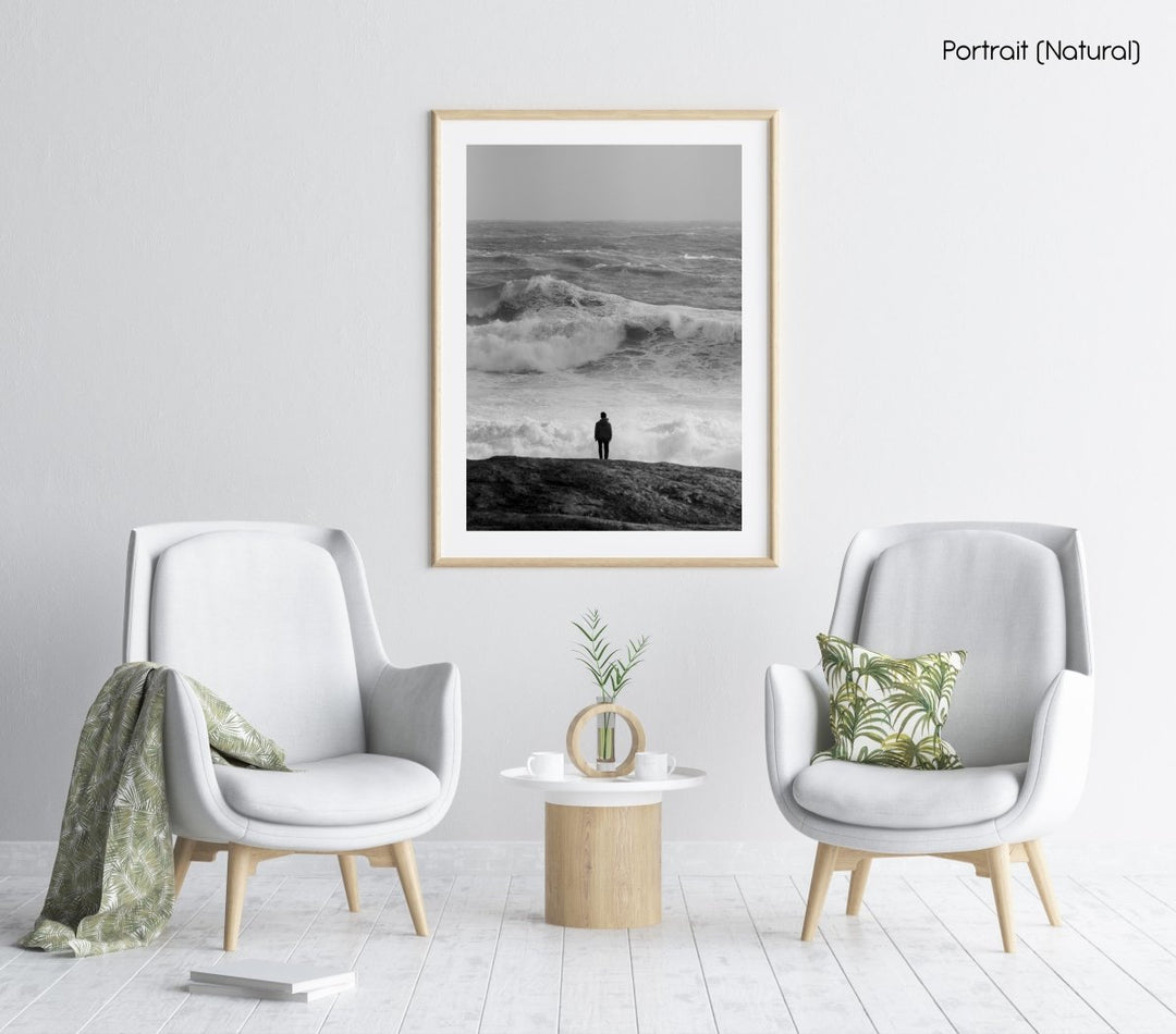 Person watching massive stormy waves photography