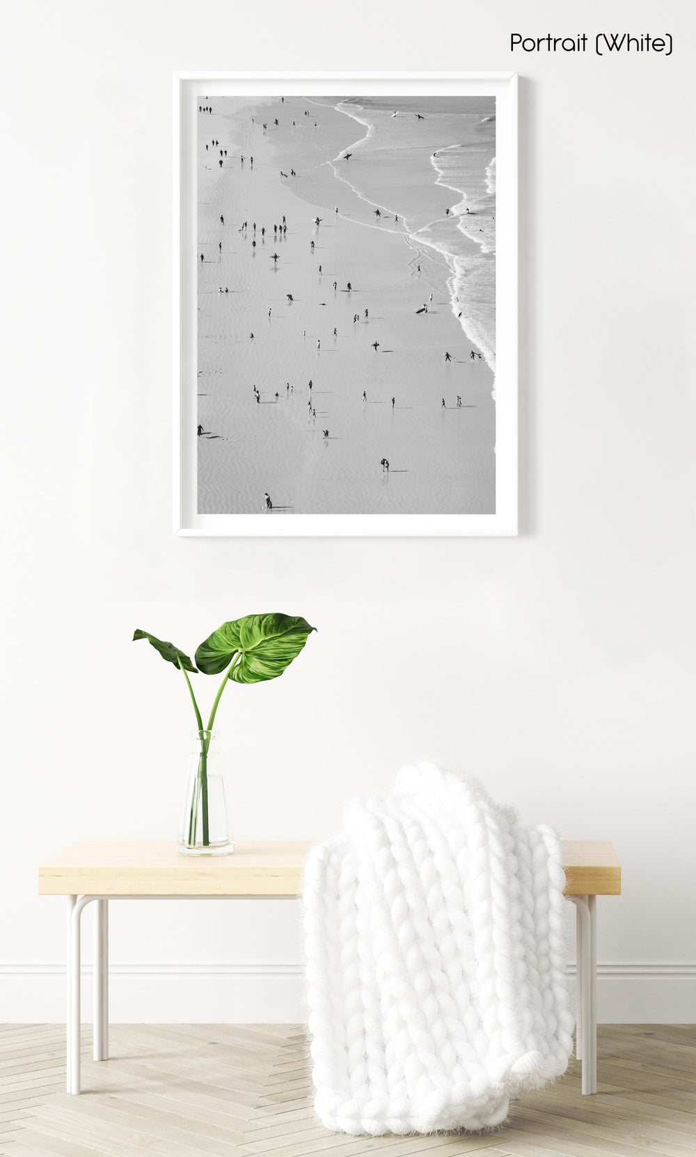 Many people on beach in black and white