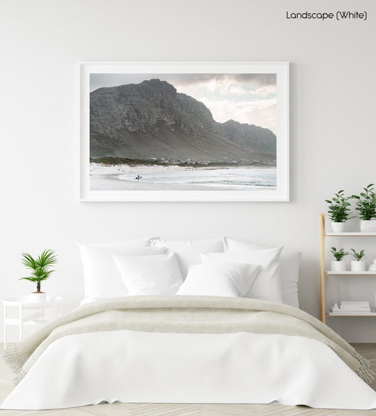 Betty's Bay beach with mountain and surfer