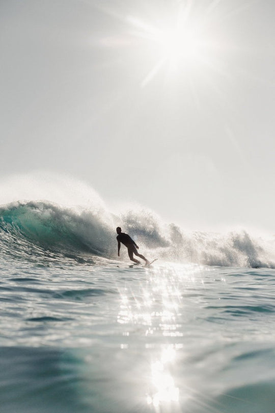 Waterhousing photo surfer on wave