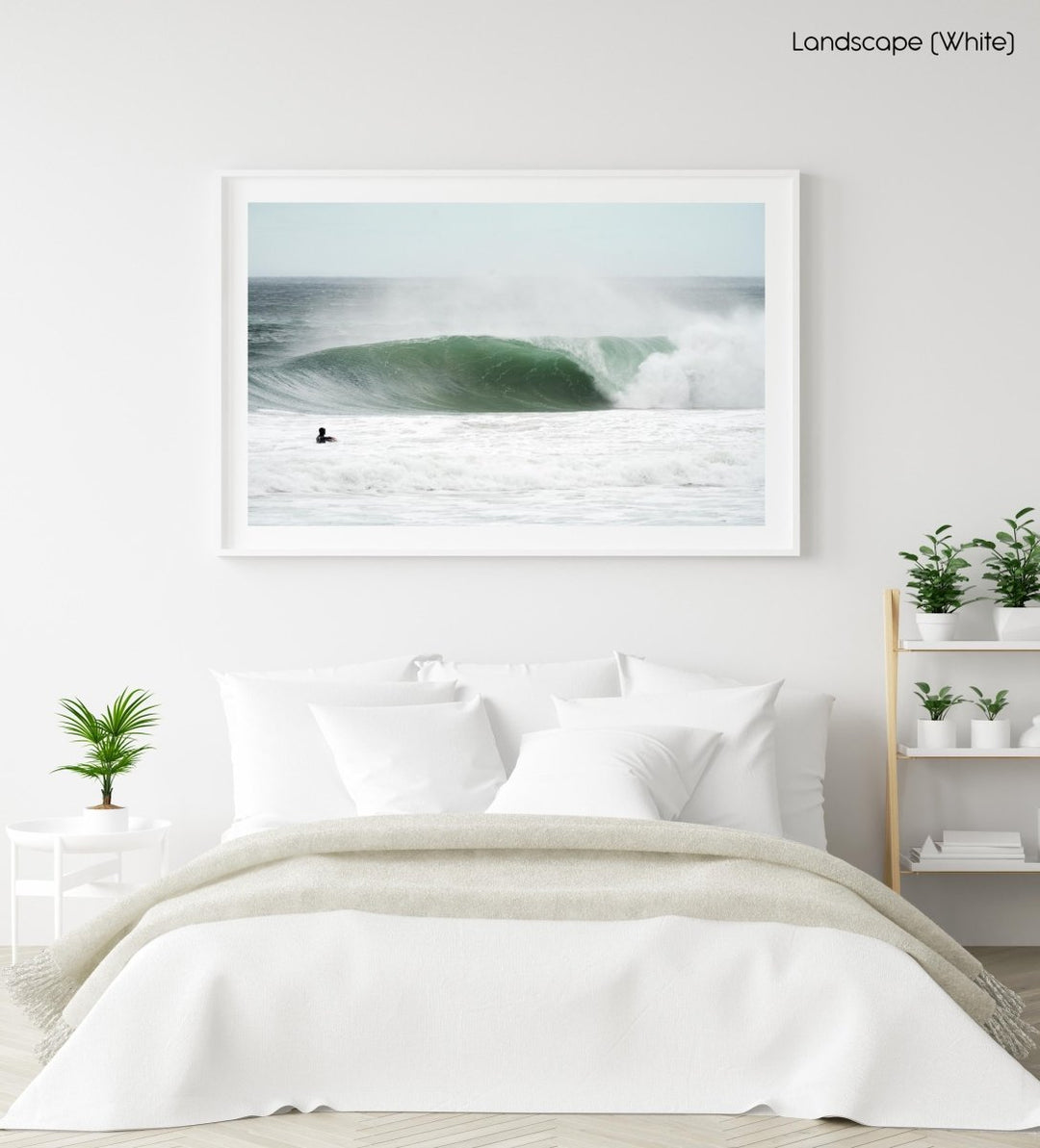 Big grey wave with person watching from water