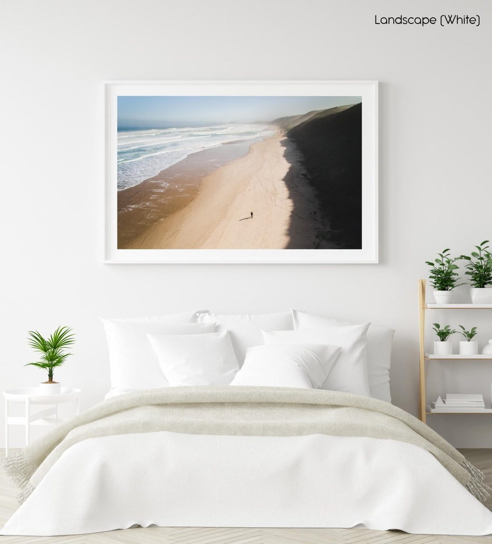 Aerial of person walking on brenton beach near Knysna