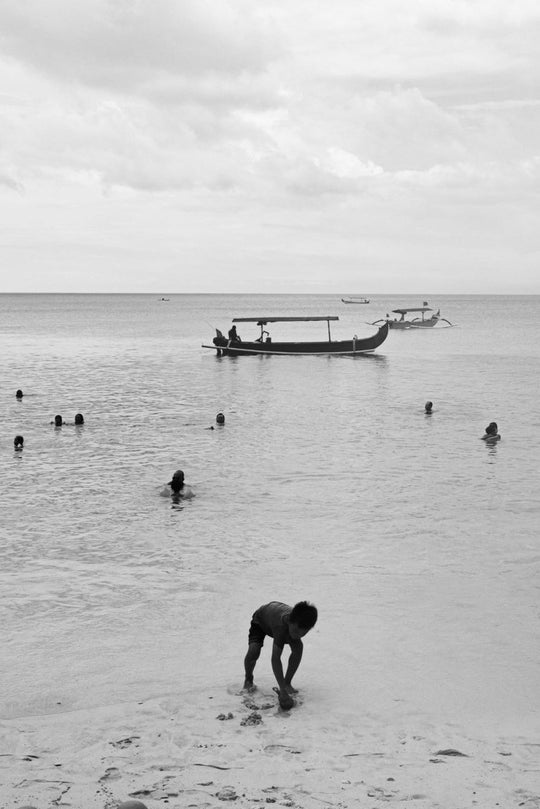 Kids playing on beach in Uluwatu, Bali