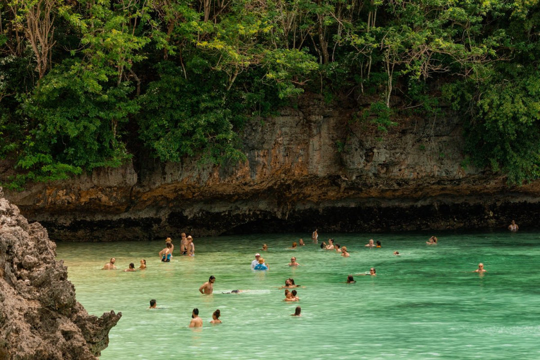 People swimming in Uluwatu, Bali